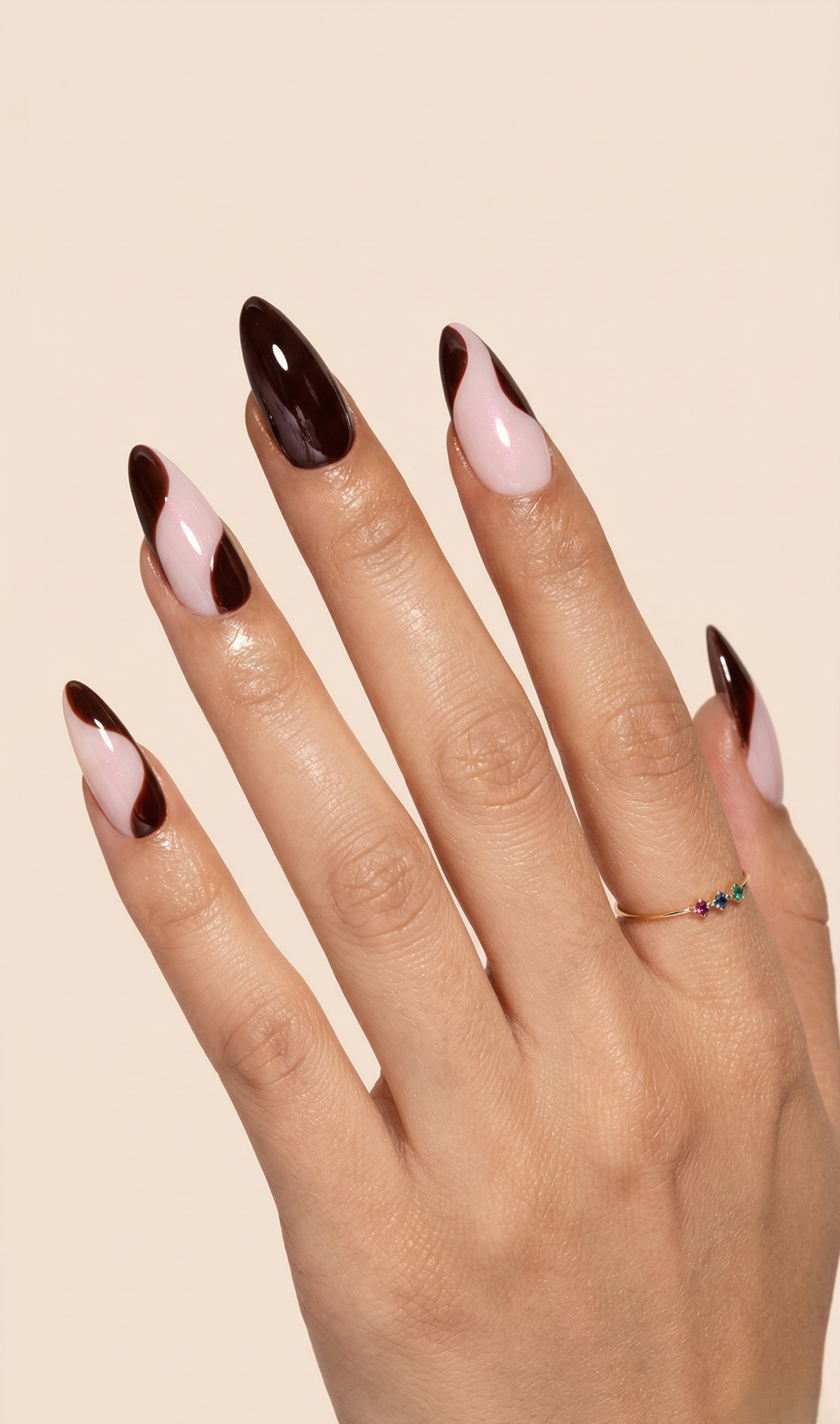 Dark oxblood swirl gel nail design on almond-shaped nails — DIY tutorial